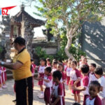 Bhabinkamtibmas Singakerta Ikut Olah Raga Sambil Bermain Bersama Murid TK Kertasari
