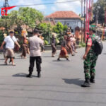 Bhabinkamtibmas Bersinergi Amankan Upacara Pitra Yadnya/Ngaben Desa Adat Gianyar